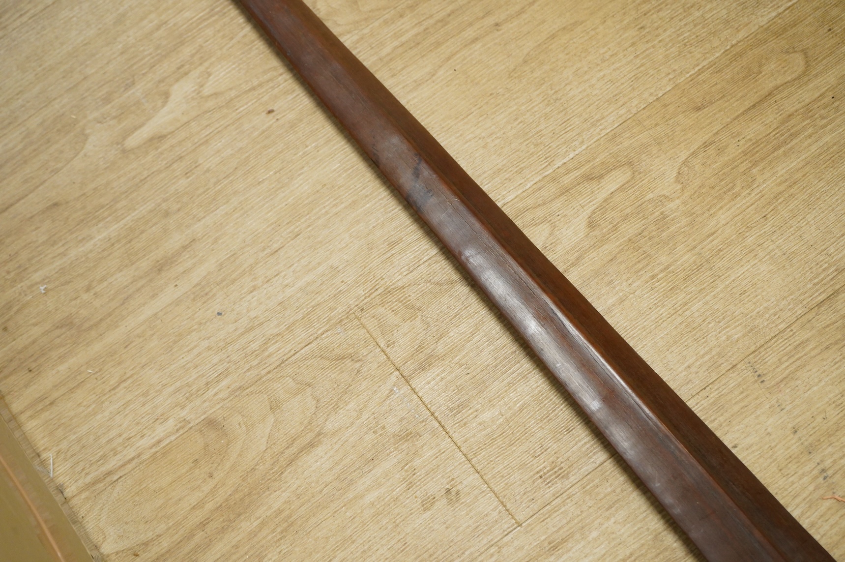 Polynesia - A Niue club with a tapering shouldered blade, early 20th century, 205cm long